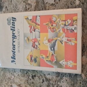 Motorcycling   By  Ross R. Olney